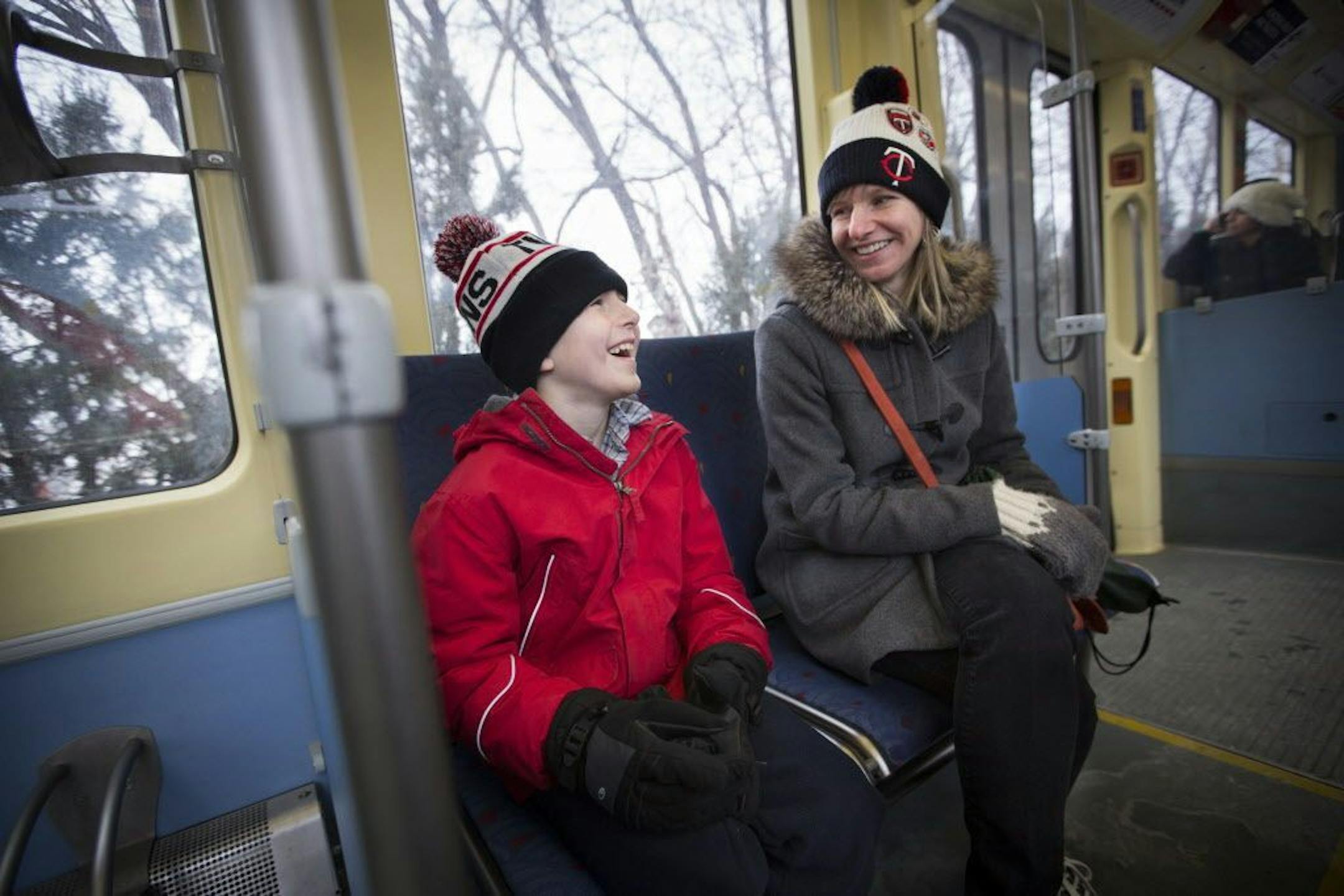 Karlis Barobs is a "trainiac." He rides the train every chance he gets, and is a devoted fan of the Choo Choo Bob train store and TV show. He is pictured while riding the Light Rail with his mother Jane Meyer on Monday, February 8, 2016 in Minneapolis, Minn.