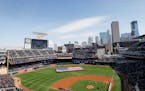 Four T-38s from the U.S. Air Force fly over Target Field in Minneapolis during the national anthem before a Minnesota Twins game.