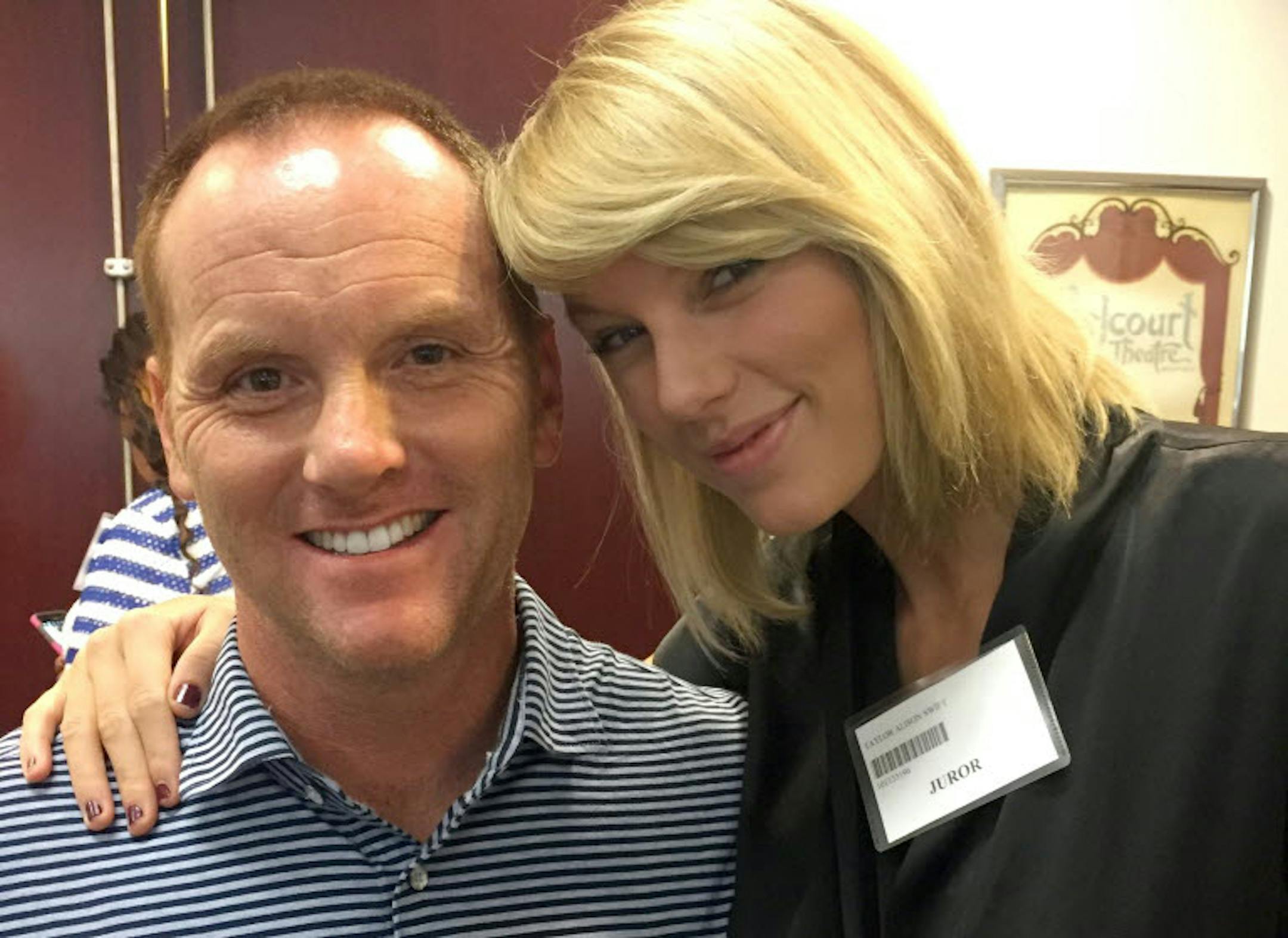 Taylor Swift posed with Bryan Merville in a courthouse waiting area in Nashville, Tenn., on Monday, Aug. 29, 2016, before a Nashville judge dismissed her from the jury pool. Merville said he took a photo with Swift for his daughters, who are huge fans.