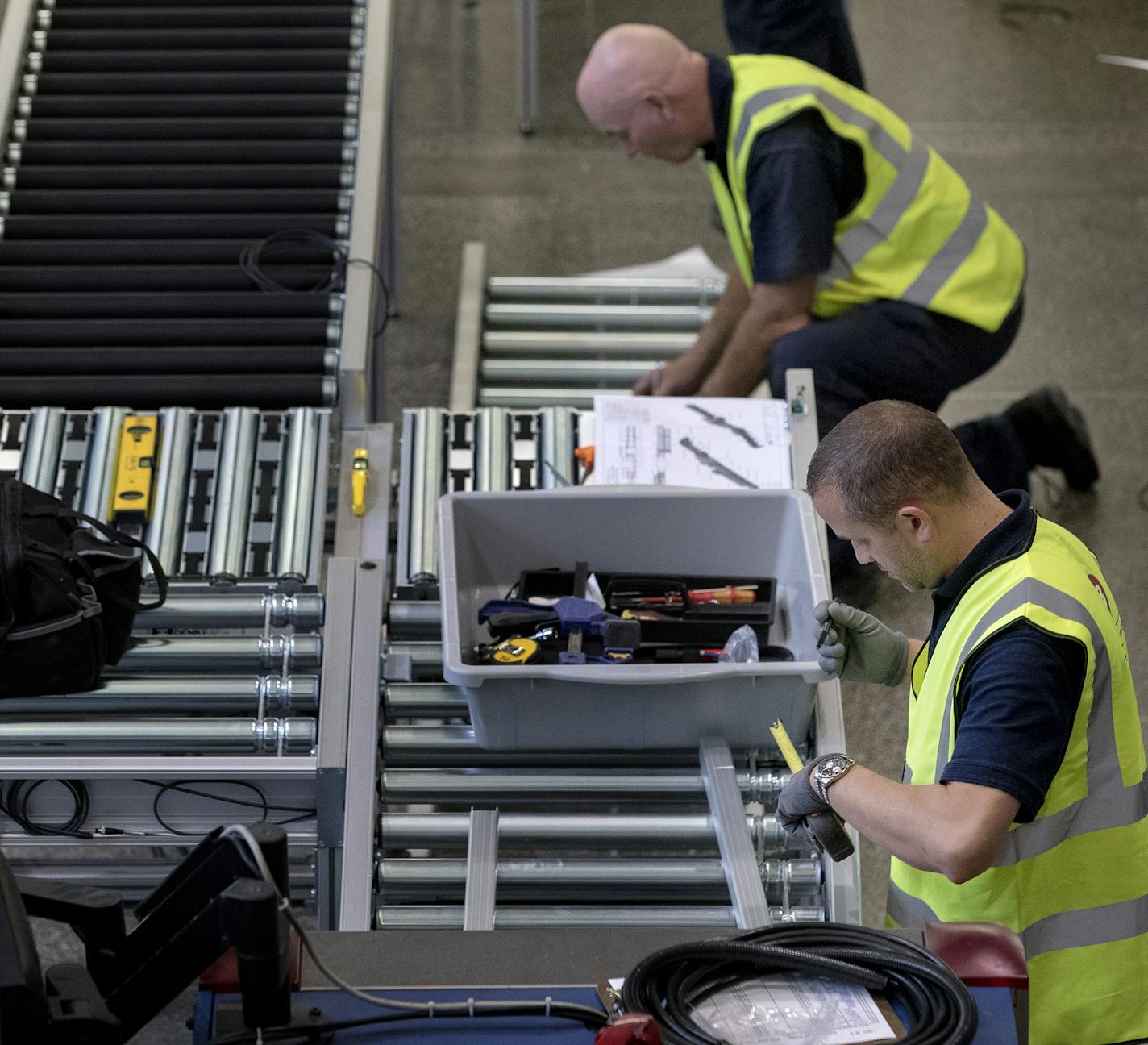 Workers installed new automatic screening lanes in the south checkpoint at the Minneapolis-St. Paul International Airport. The four lanes will be available for first class and pre check travelers. ] CARLOS GONZALEZ &#xef; cgonzalez@startribune.com - August 22, 2017, Bloomington, MN, MSP Airport Terminal 1, Passengers flying out of Minneapolis-St. Paul International Airport may need extra time to pass through security as all the general lanes at the south security checkpoint in Terminal 1 will be