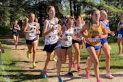 A pack of runners competed Thursday at the St. Olaf Showcase, where heat and humidity were on officials’ minds.