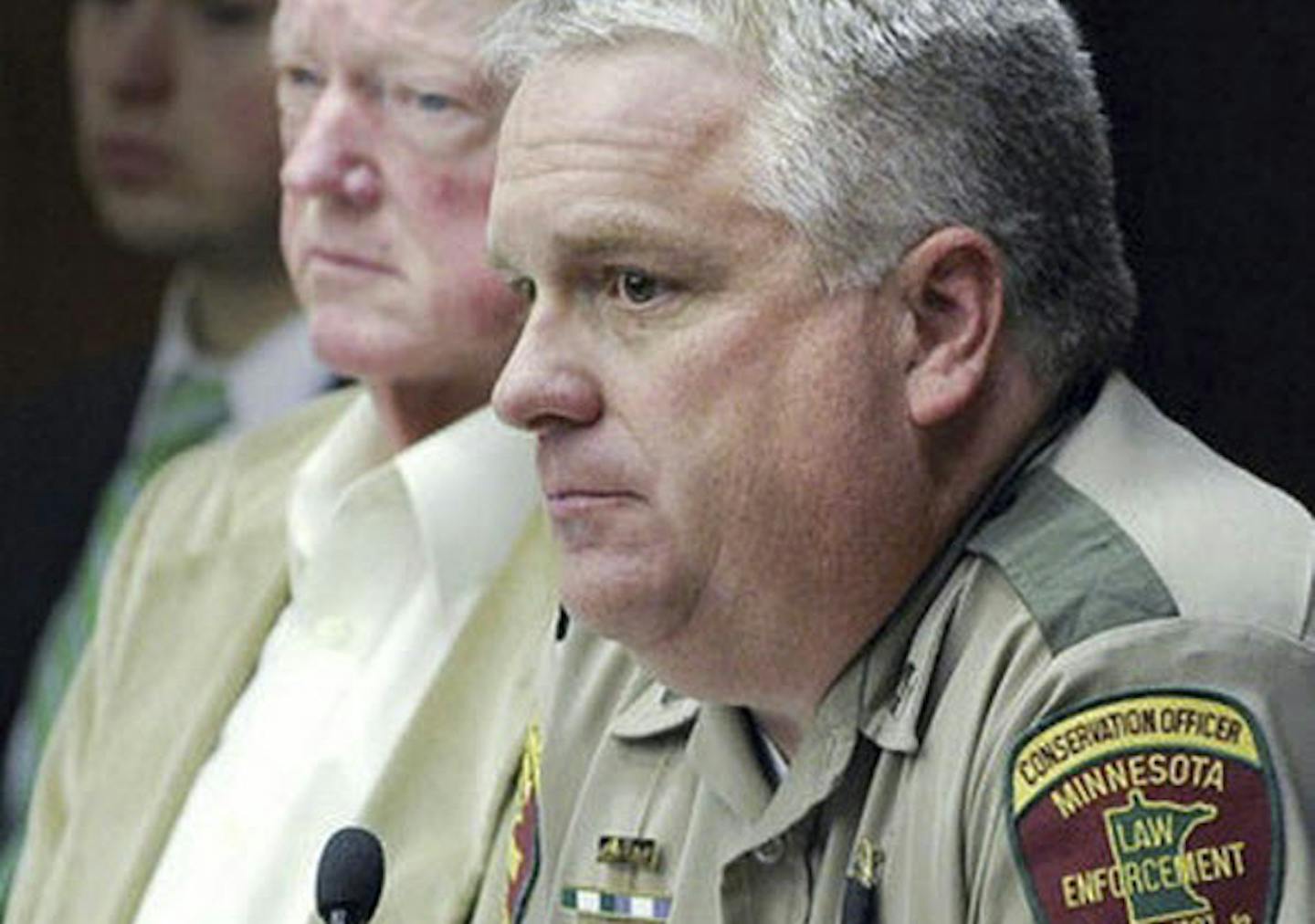 2010 photo of John Hunt, right, the former administrative manager for the DNR.