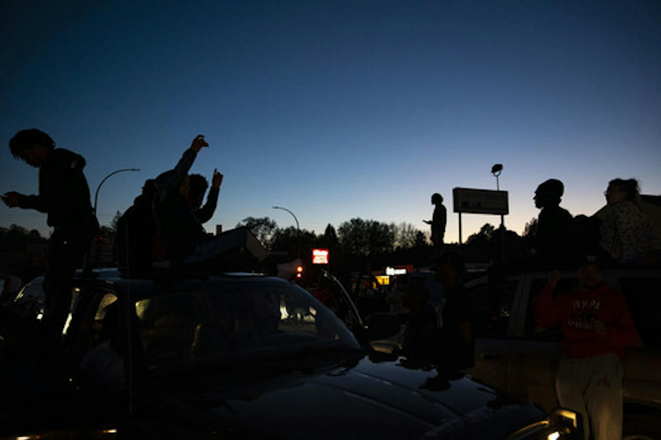 Protesters blocked off Central Avenue and had a street party where they danced, drank and smoked marijuana during the protest in Duluth on Saturday, May 30. Earlier in the day more than 1,000 people marched through the streets of Duluth.
