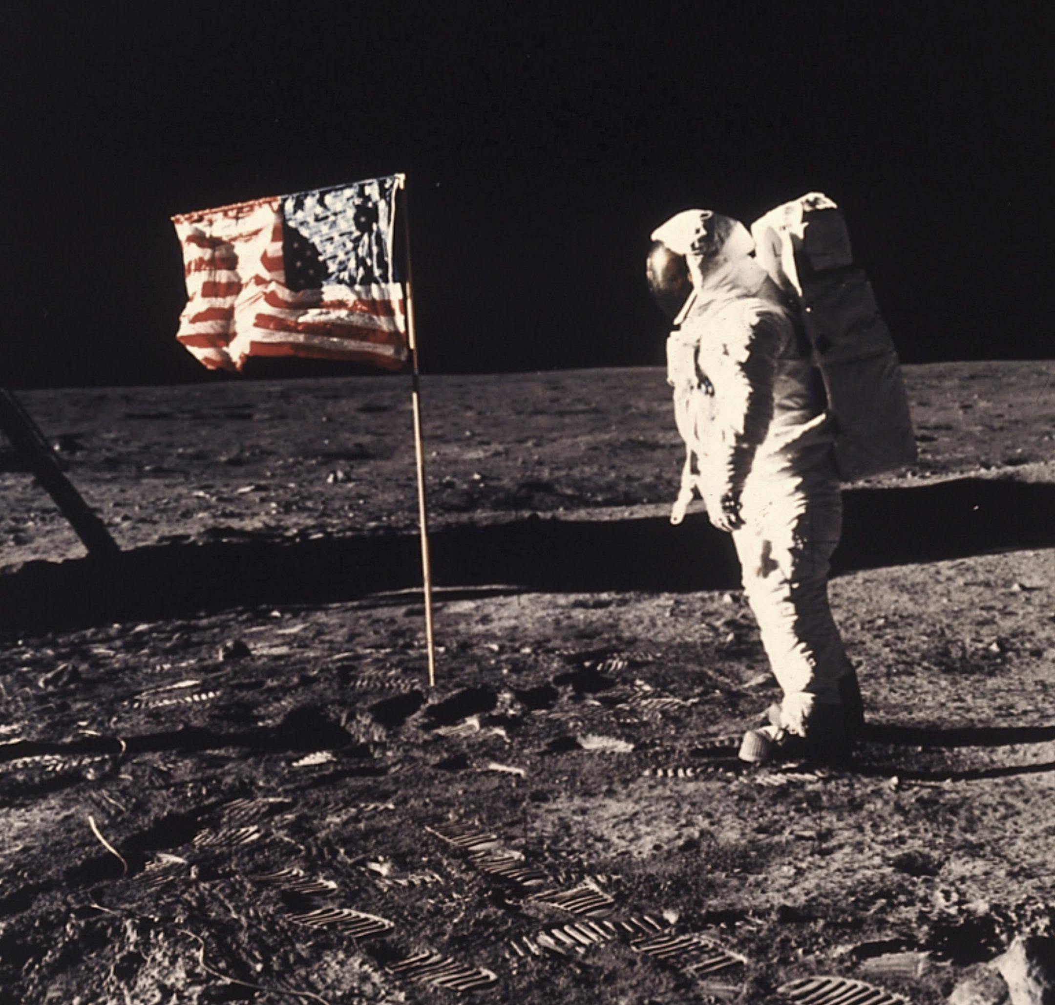 FILE — In an undated handout photo, Edwin E. Aldrin Jr., known as Buzz, beside the U.S. flag deployed on the moon during the Apollo 11 mission on July 20, 1969. With deep space exploration on the horizon, researchers say more research on radiation exposure and cardiovascular disease is needed. (Neil A. Armstrong/NASA) -- FOR EDITORIAL USE ONLY -