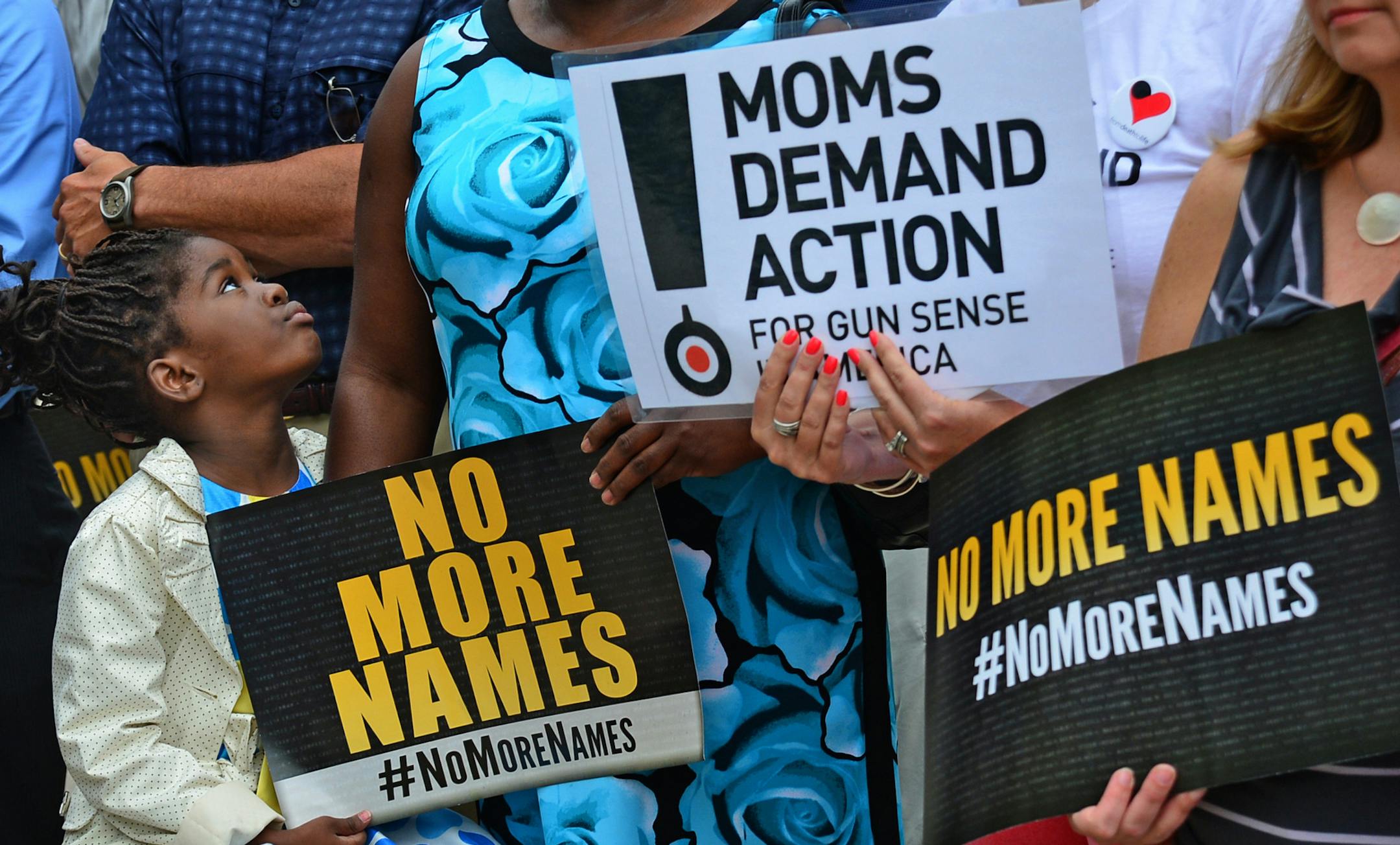A national gun-control campaign drew Twin Cities officials, shooting survivors and local supporters to rally Wednesday outside the federal courthouse in Minneapolis. Arvina Smith, 6, of Crystal, and her mother, Aissatu Keita, listened to the names of gun violence victims since the Sandy Hook Elementary School massacre in December.