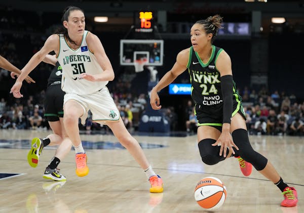Lynx forward Napheesa Collier (24) and Liberty forward Breanna Stewart (30), seen May 25 at Target Center, each posted a double-double on Tuesday in N