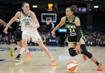 Lynx forward Napheesa Collier (24) and Liberty forward Breanna Stewart (30), seen May 25 at Target Center, each posted a double-double on Tuesday in N