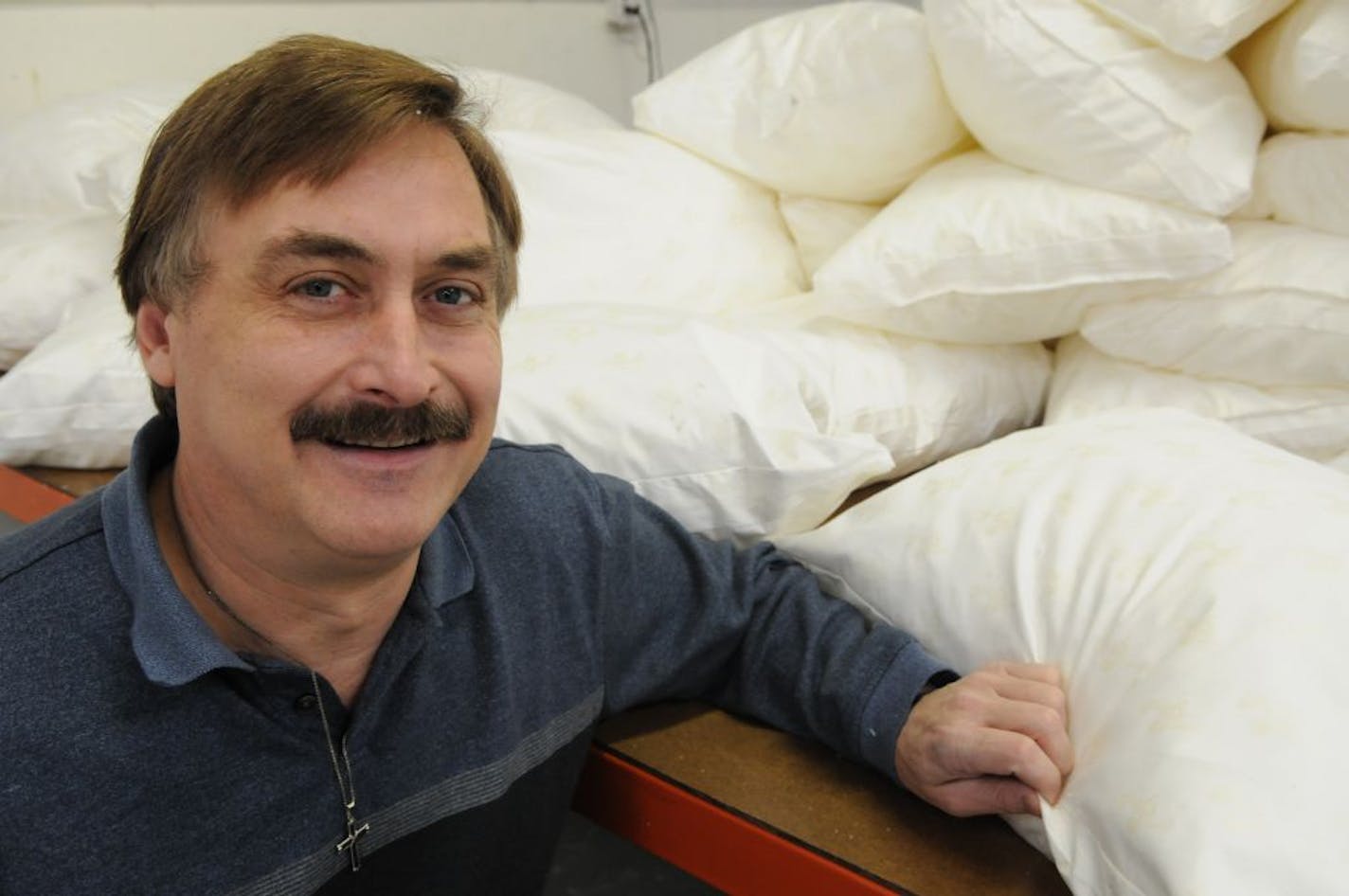 Carver, Mn Monday 12/27/10 Mike Lindell, president of My Pillow with some of the pillows that are ready to ship.