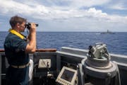 SOUTH CHINA SEA (May 20, 2022) Sa Sailor stands watch aboard the Arleigh Burke-class guided-missile destroyer USS Chung-Hoon (DDG 93) while underway w