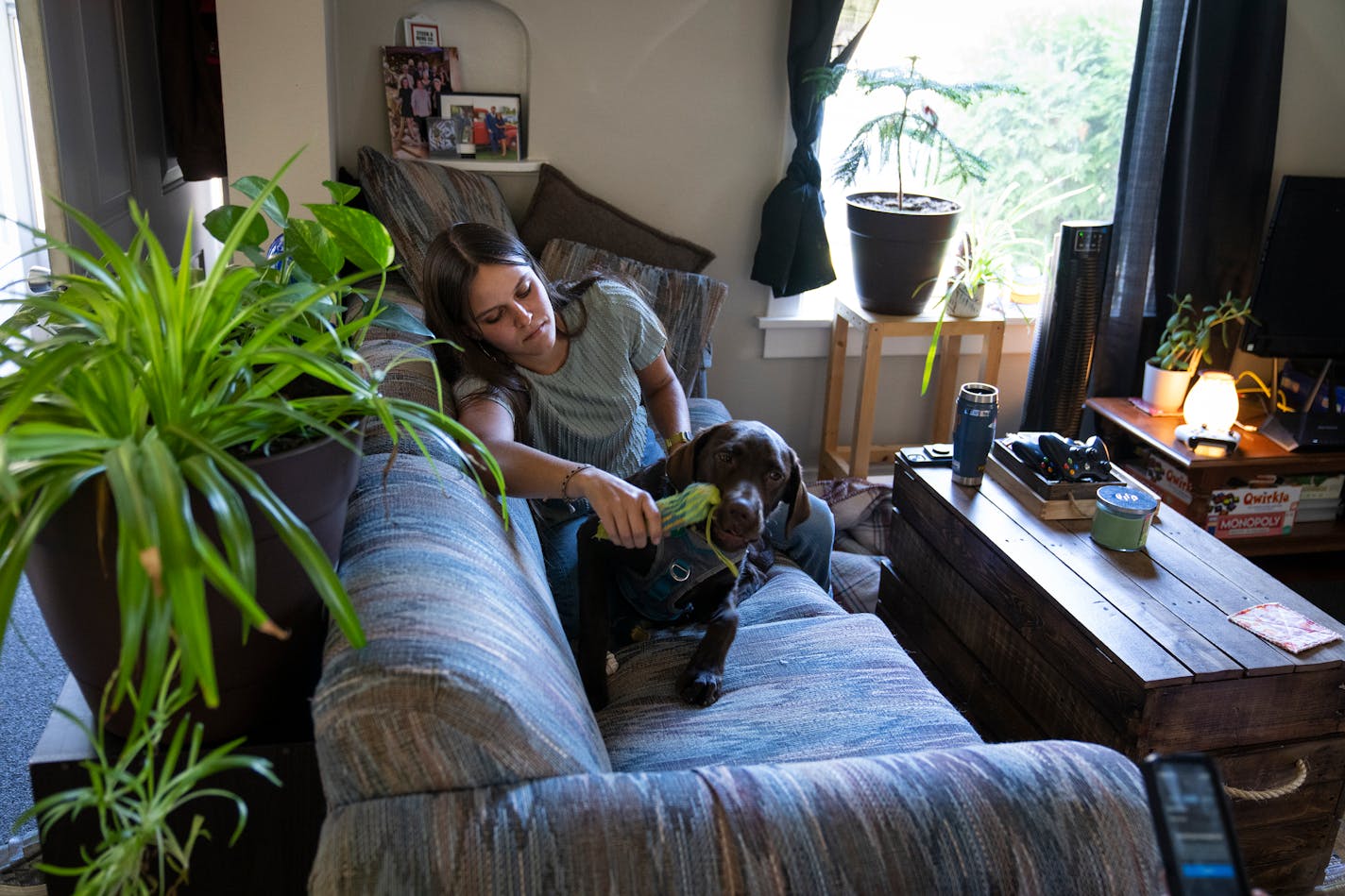 Annalie Peterson with her dog Waylon in her home in Baraboo, Wis. on Thursday, Sept. 14, 2023.