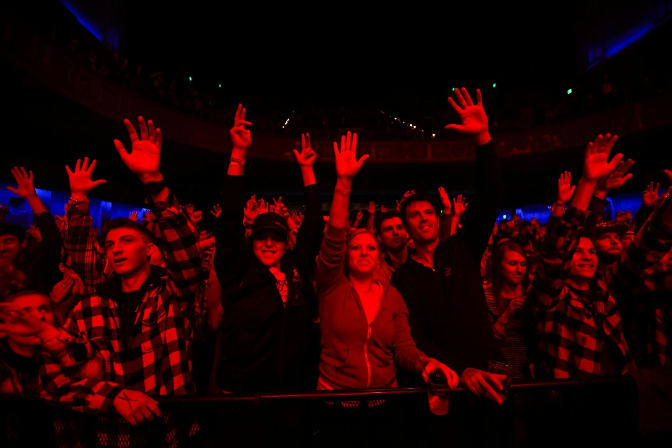 Concertgoers waved their hands as Sims performed Friday night.