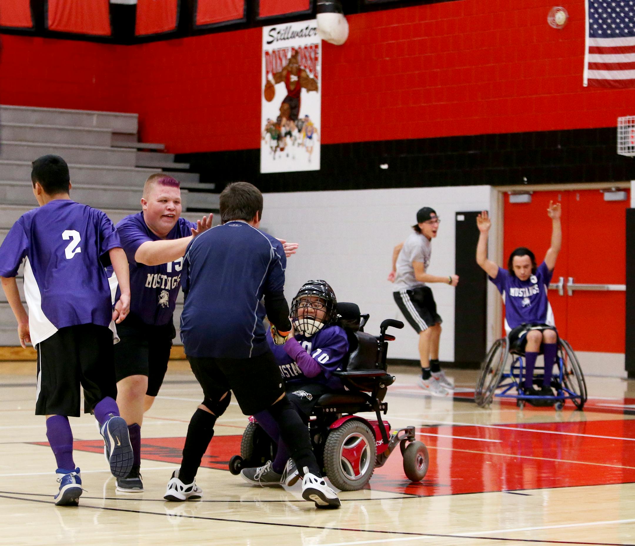 Anoka-Hennepin players celebrate their team's 2-0 win.
