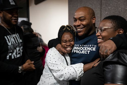 Marvin Haynes embraces his neices Destiny Coleman and Grace Coleman after being released from prison on Monday, Dec. 11, 2023 in Minneapolis, Minn. After serving 20 years in prison from the age 16, Marvin Haynes was exonerated from a murder conviction and released on Monday, Dec. 11, 2023. ] RENEE JONES SCHNEIDER • renee.jones@startribune.com