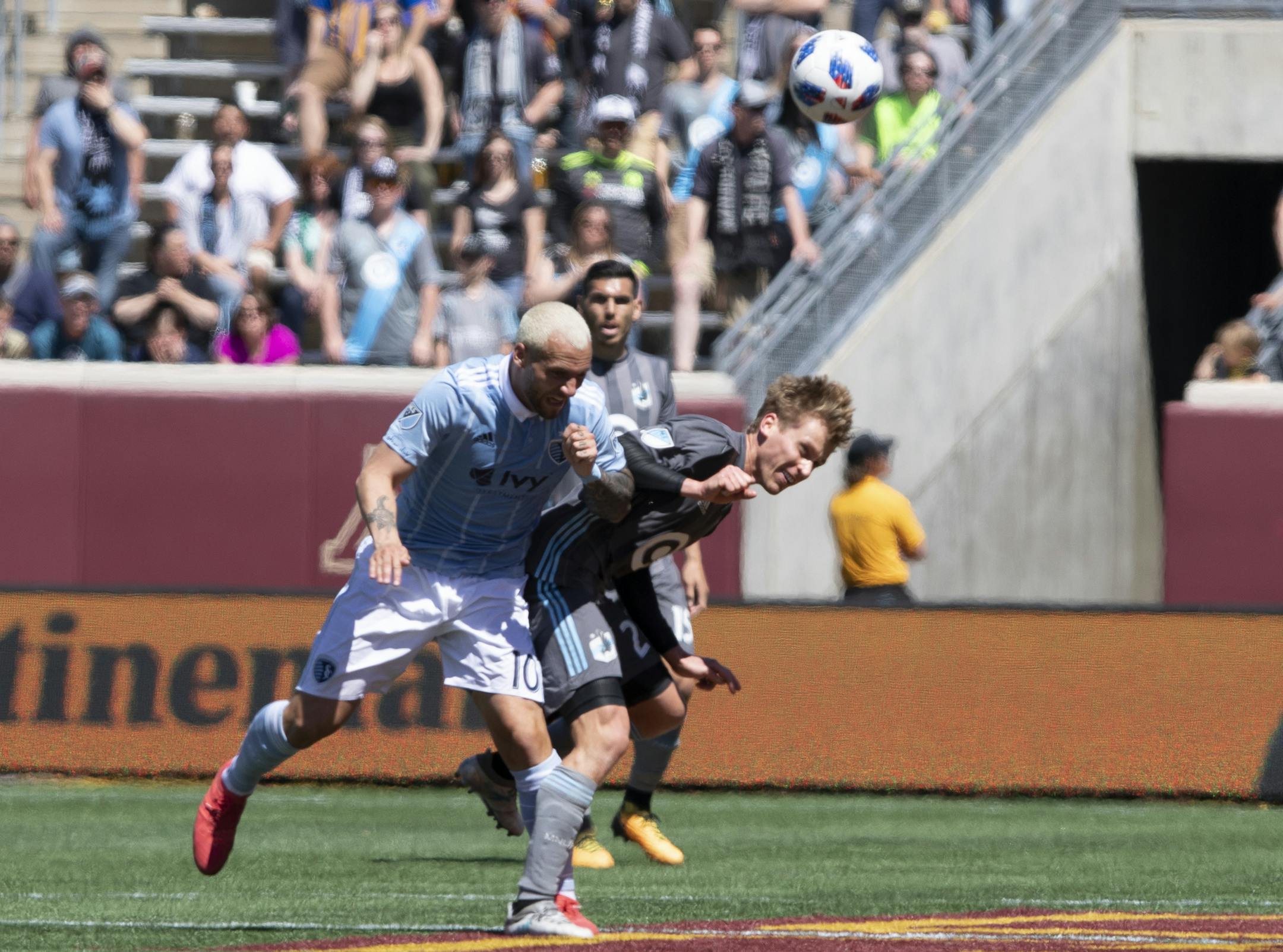 Sporting Kansas City midfielder Yohan Croizet (10) and Minnesota United midfielder Rasmus Schuller (20) collide in midfield. [ Special to Star Tribune, photo by Matt Blewett, Matte B Photography, matt@mattebphoto.com, Minnesota United FC vs. Sporting KC, MLS Soccer, TCF Bank Stadium, 1006061755 LOON05211 Schuller is taken off and I believe is in concussion protocol.