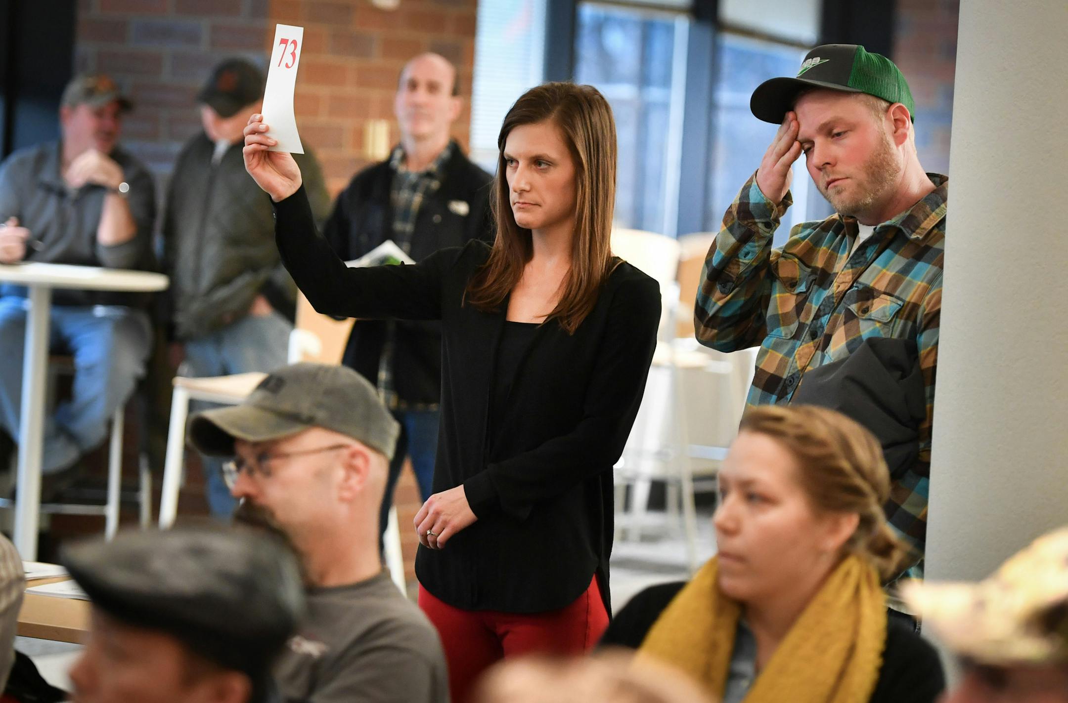 Katie Clark and her fianc&#xe9; Nick Hopp successfully bid on an won a 19.98-acre parcel of land near Columbus, Minn. ] GLEN STUBBE &#x2022; glen.stubbe@startribune.com Monday, December 18, 2017 The DNR this month is auctioning off the first public lands under a new program to carve off scattered surplus parcels and invest the proceeds in something with greater value. We look at land nearby that they are auctioning off in St. Paul.