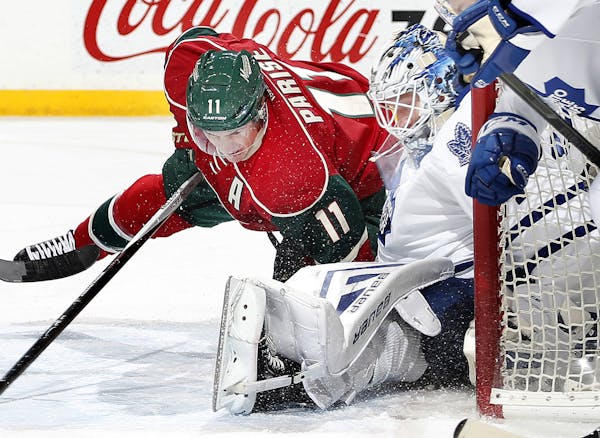 Wild winger Zach Parise collided with Maple Leafs goalie James Reimer in the first period.