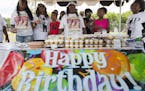 Valerie Castile, Philando Castile's mother, white hat, and Allysza Castile, khaki hat, sang happy birthday with family and friends to celebrate Philan