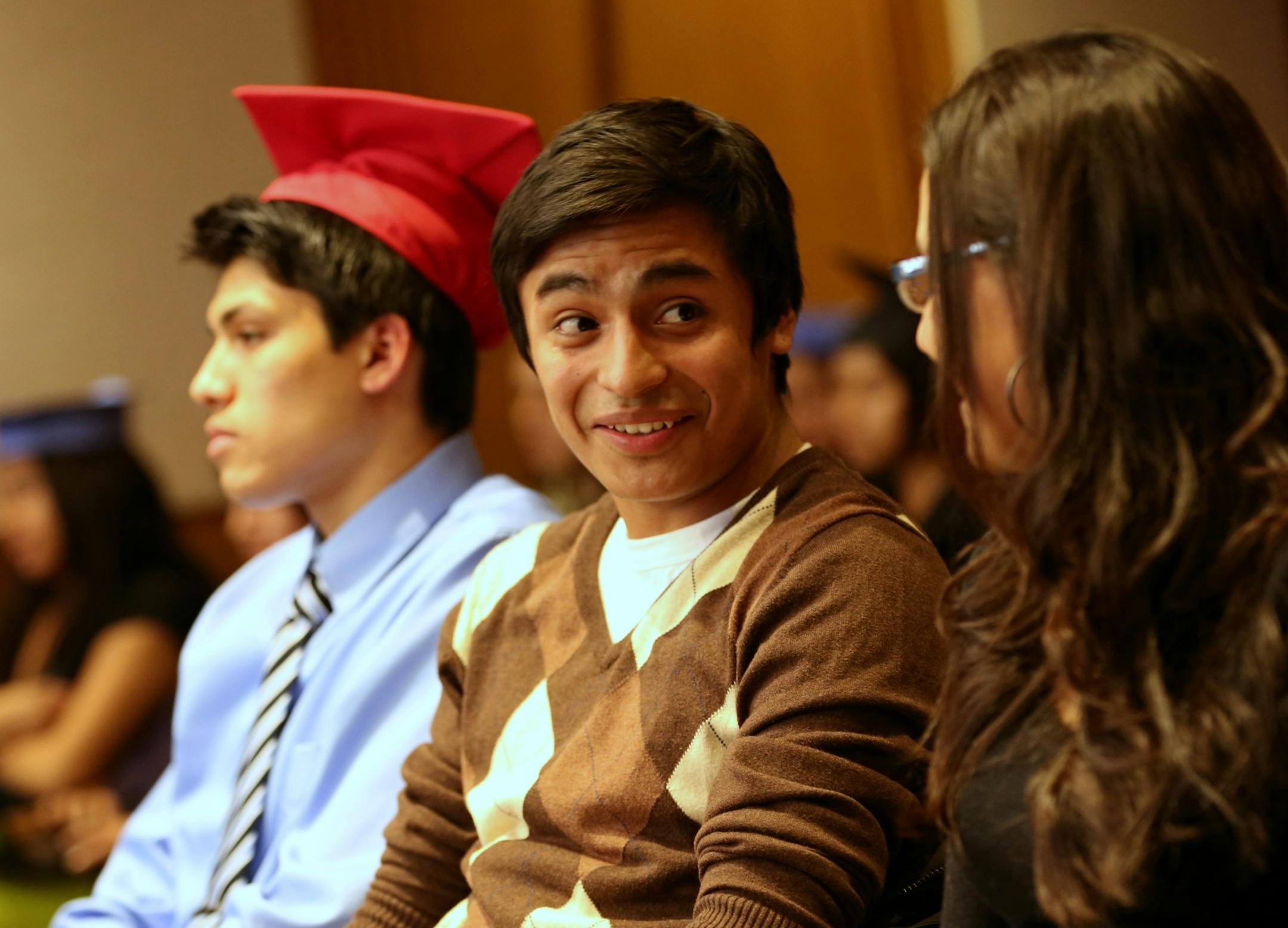 Francisco Sanchez, 18, of Northfield, smiled at his friends after testifying about the dream act at a Senate higher eduation committee hearing to consider a bill to grant undocumented immigrants in-state tuition on Thursday, March 14, 2013 at the Minnesota State Capitol in St. Paul, Minn. Sanchez came to the U.S. when he was 12. ] (RENEE JONES SCHNEIDER * reneejones@startribune.com)