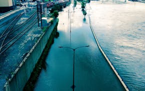 Flooding on Shepard road in St. Paul, Tues., June 24, 2014.