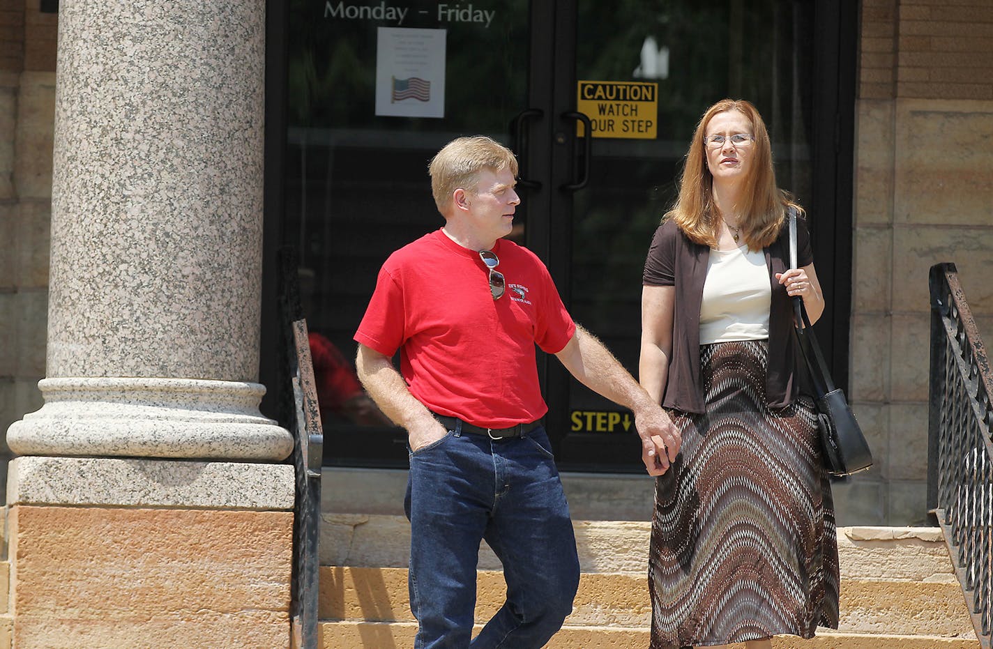 David and Stephanie La Due, left the Waseca County Court House for a lunch break as their son, John LaDue, the would-be school shooter in Waseca, made an appearance in court for a hearing on whether he should be certified as an adult, Tuesday, June 30, 2015 in Waseca, MN. ] (ELIZABETH FLORES/STAR TRIBUNE) ELIZABETH FLORES &#x2022; eflores@startribune.com