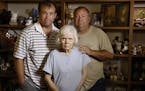 Kent, left, and Mark Olds stand with their mother Gail, 80, in Gail's Dallas home on Thursday, June 11, 2015. Gail has dementia but denies it. Her son
