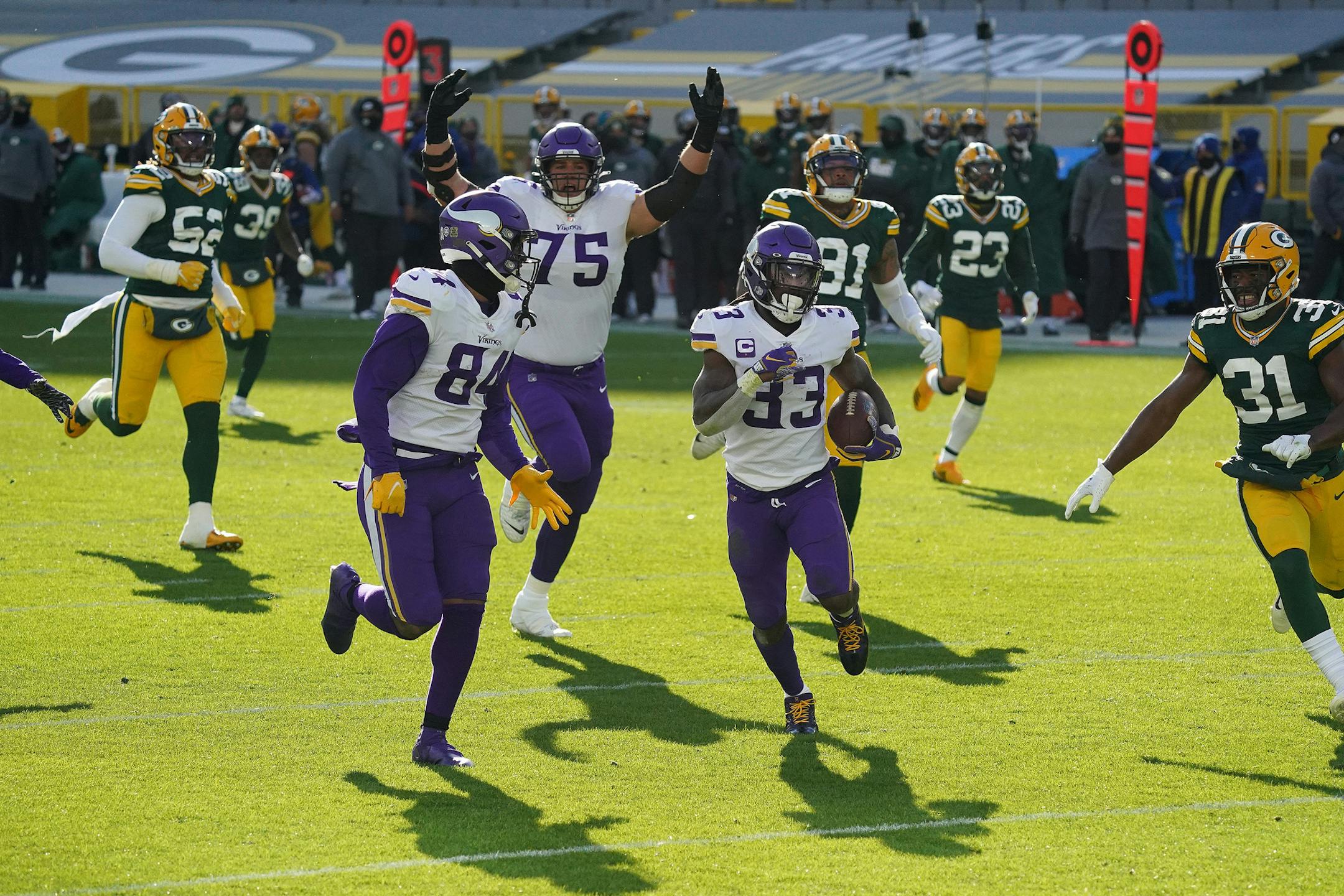Minnesota Vikings running back Dalvin Cook (33) broke past the Green Bay Packers defense as he ran the ball in for a touchdown in the third quarter. ] ANTHONY SOUFFLE • anthony.souffle@startribune.com The Minnesota Vikings played the Green Bay Packers, sans fans to comply with restrictions meant to slow the spread of COVID-19, Sunday, Nov. 1, 2020 at Lambeau Field in Green Bay, Wis.