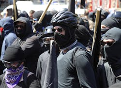 Antifa protesters dressed in black, demonstrate during a &#x201c;Stand Against Hate&#x201d; rally at Martin Luther King Jr. Civic Center Park in Berke