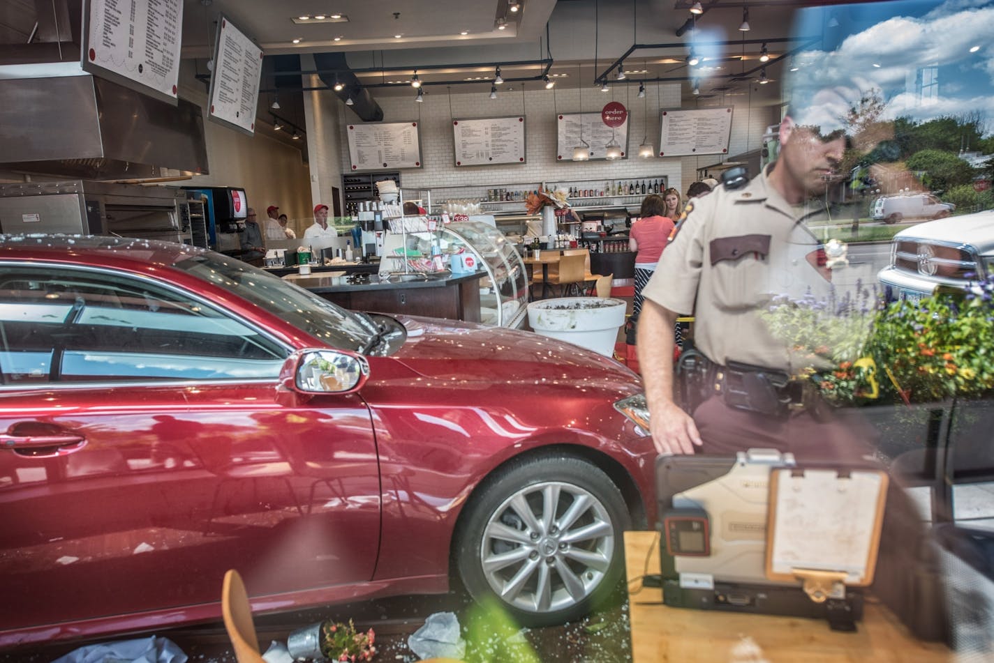 Minnesota State Troopers investigated a vehicle that crashed through the doors of Yum Kitchen and Bakery on 4000 Minnetonka Blvd, St. Louis Park Wednesday afternoon.