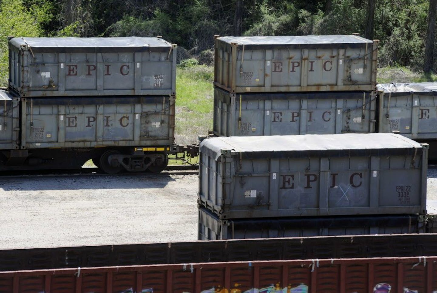 This April 12, 2018 photo shows containers that were loaded with tons of sewage sludge in Parrish, Ala.