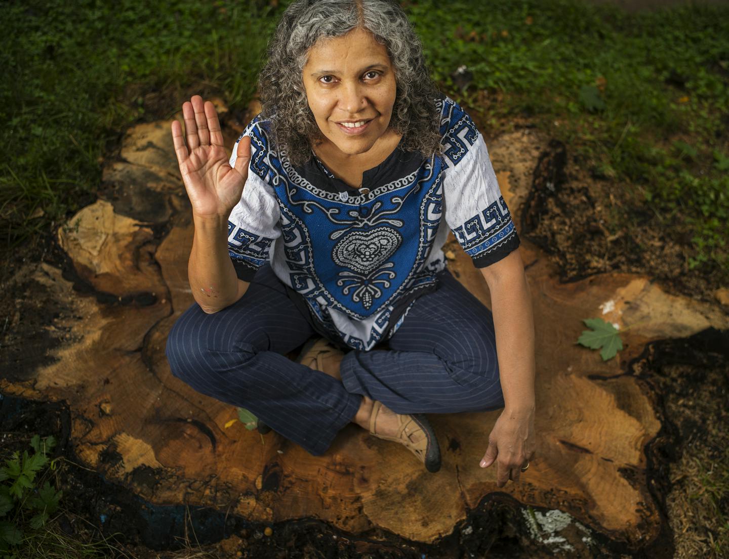 Hend Al-Mansour had three figures painted on the tree trunk that once stood in front of her home in the Union Park area of St. Paul, including one that upheld the Hand of Fatima to dispel the evil eye.]RichardTsong-Taatarii richard.tsong-taatarii@startribune.com