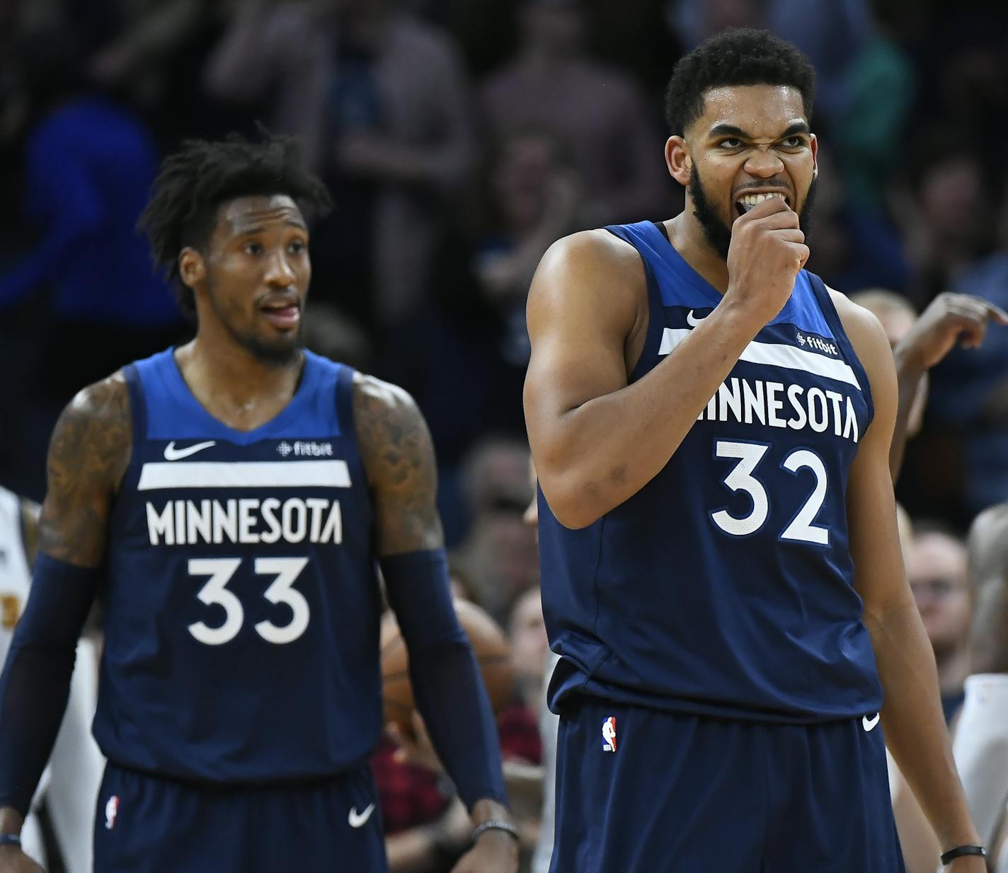 Minnesota Timberwolves center Karl-Anthony Towns (32) reacted after dunking the ball as he was fouled by Denver Nuggets forward Paul Millsap (4) for an and-one opportunity in the second half. ] Aaron Lavinsky &#x2022; aaron.lavinsky@startribune.com The Minnesota Timberwolves played the Denver Nuggets on Wednesday, Nov. 21, 2018 at Target Center in Minneapolis, Minn.