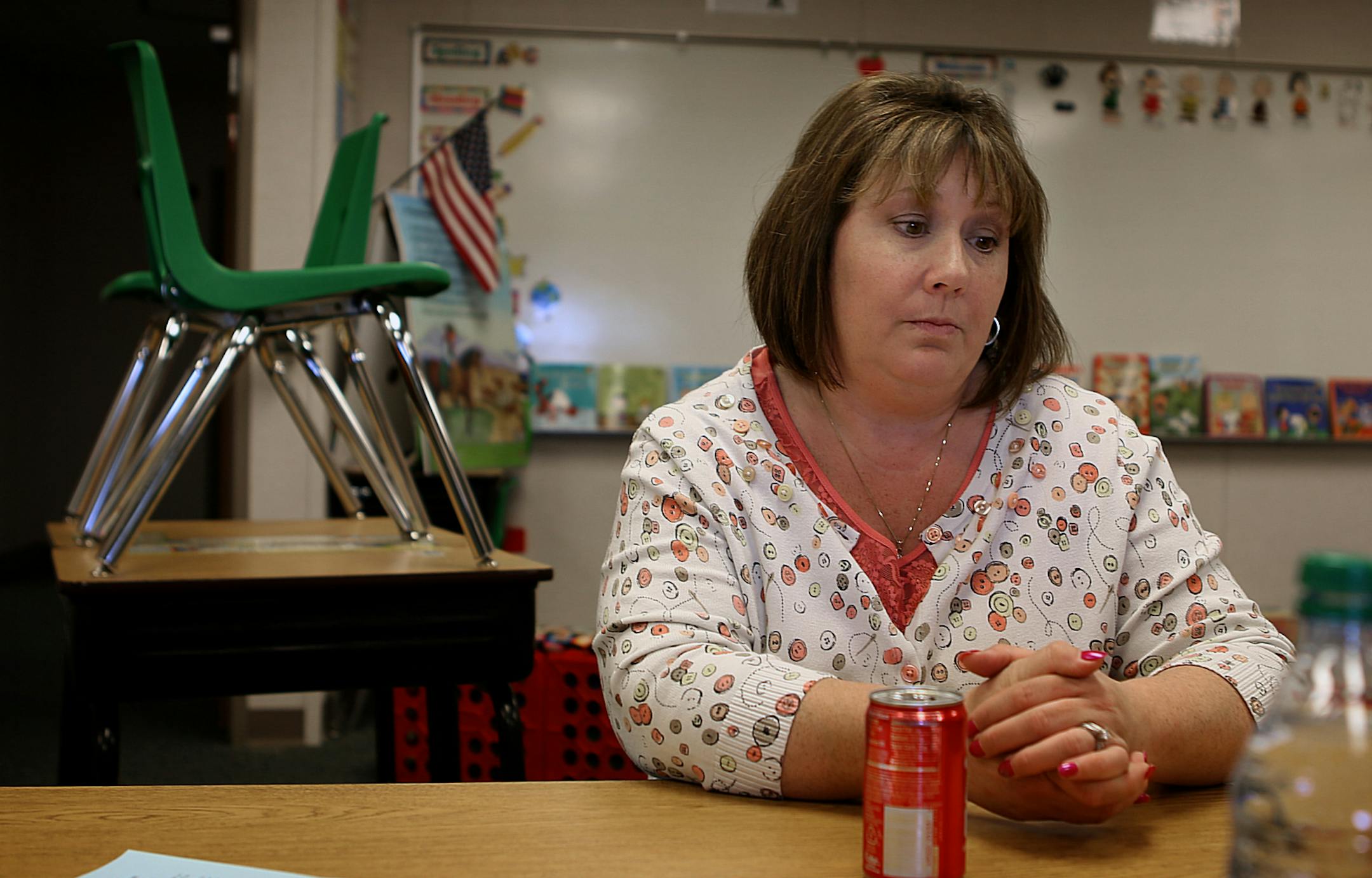 Kim Roth taught second grade at Round Prairie Elementary School neat the North Dakota-Montana Border near Williston, but has since moved out of the area to her in-laws‚Äô family farm northeast of Minot. ] (JIM GEHRZ/STAR TRIBUNE) / December 10, 2013, Williston/Napoleon, ND ‚Äì BACKGROUND INFORMATION- PHOTOS FOR USE IN FIFTH PART OF NORTH DAKOTA OIL BOOM PROJECT: While many have migrated to the Bakken oil fields in search of fortune and adventure, others have cho