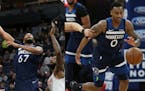 Taj Gibson (left) and Jeff Teague stepped up their scoring to make up for the injured Karl-Anthony Towns and Andrew Wiggins in the Timberwolves' 103-9