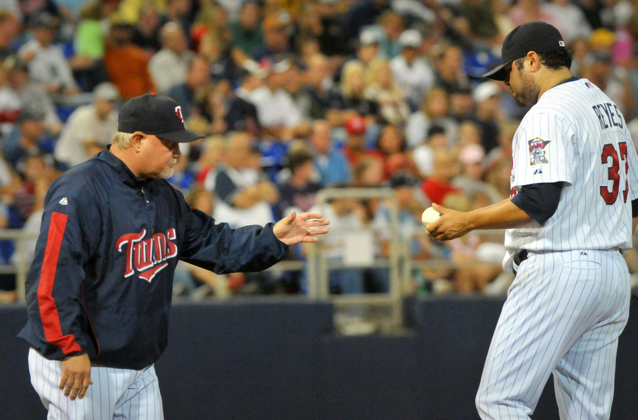 Manager Ron Gardenhire took reliever Dennys Reyes out of the game after he gave up a two-run homer to Detroit's Curtis Granderson.