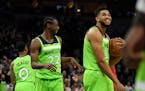 Minnesota Timberwolves center Karl-Anthony Towns (32) and forward Andrew Wiggins (22) were all smiles following their team's 115-109 victory over Toro