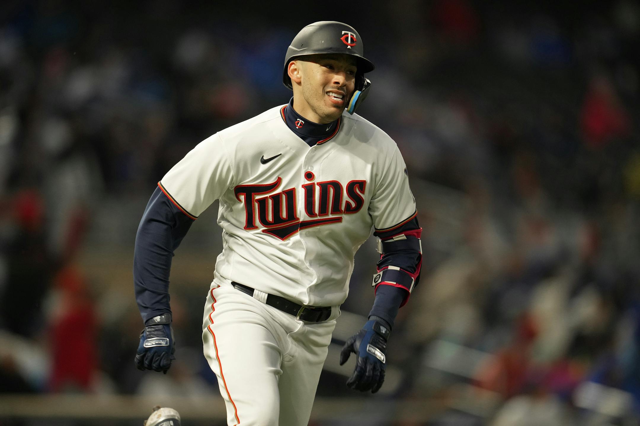 Minnesota Twins shortstop Carlos Correa (4) singles in the first inning.
