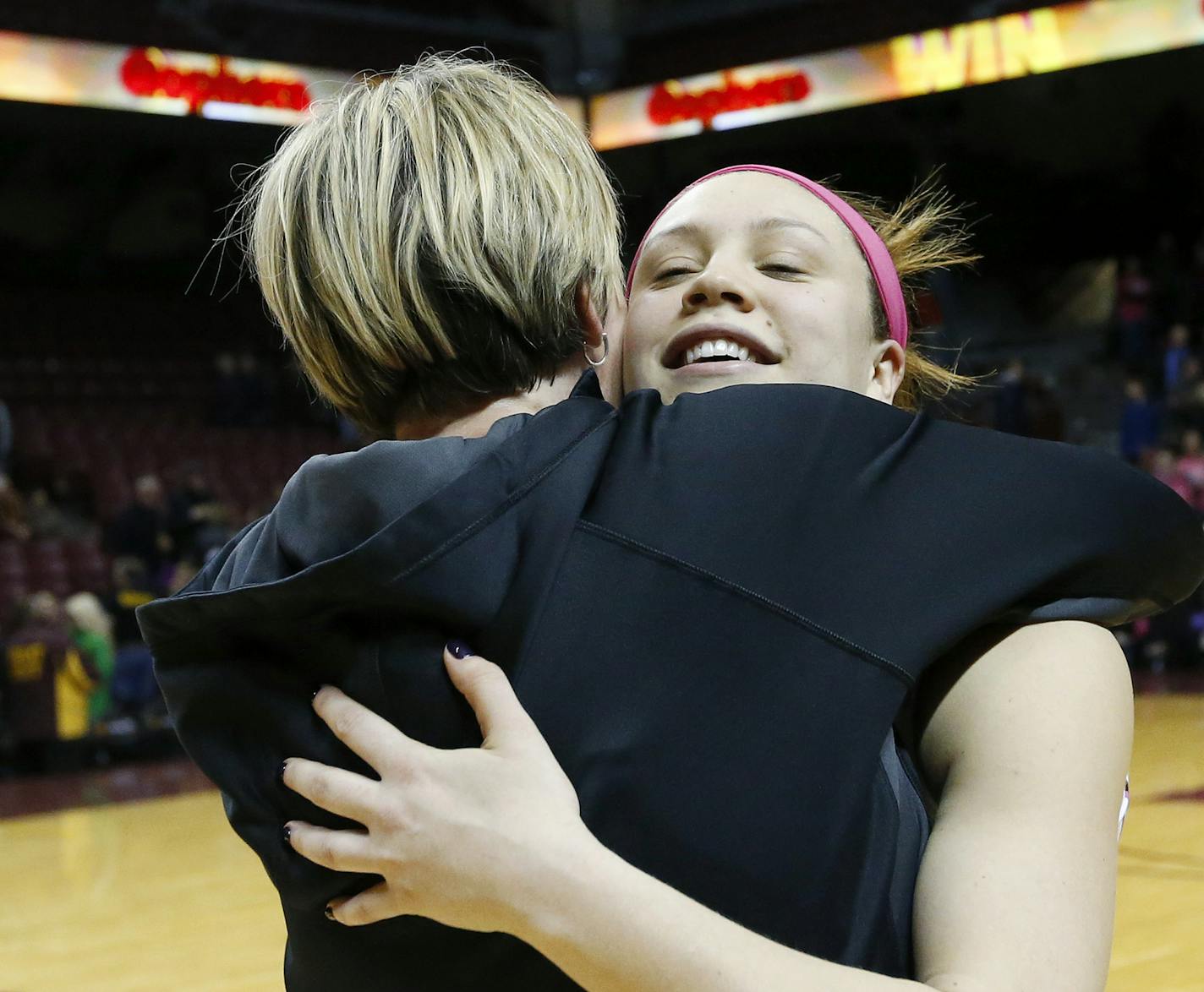 Rachel Banham hugged Gophers coach Marlene Stollings at the end of the game. Banham made 15 of 31 shots and finished with 35 points, including hitting the game-winner in the final second.