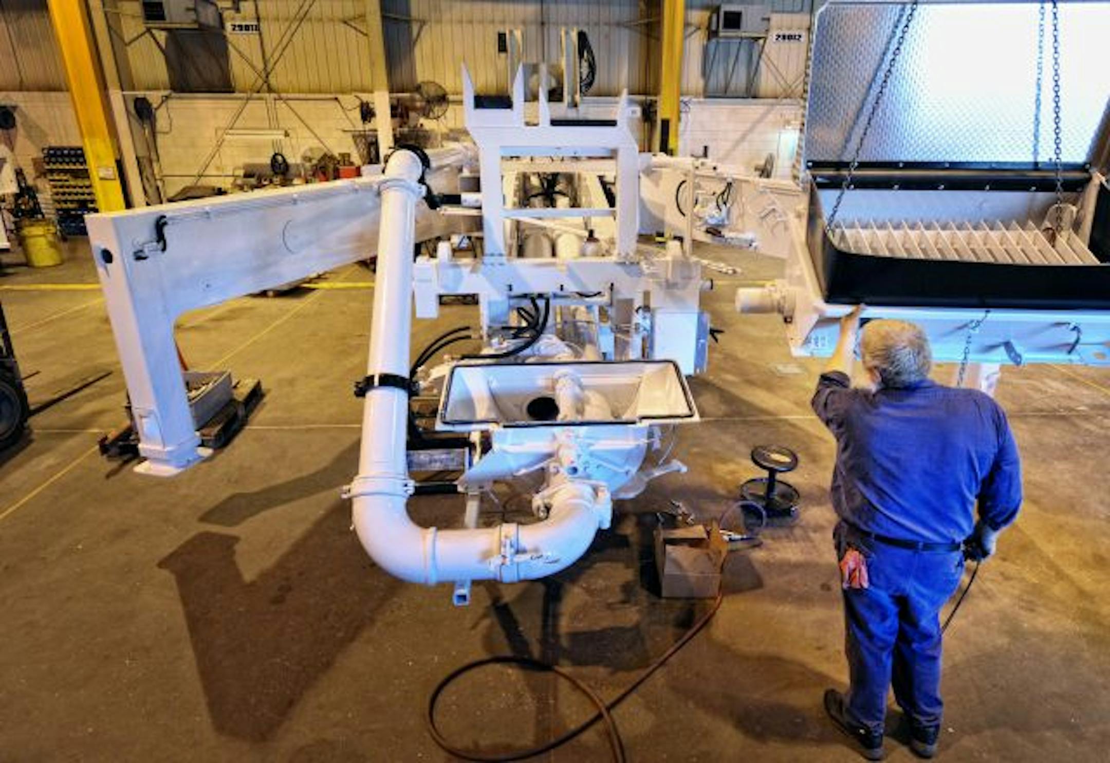 Two years ago, Schwing had to turn away orders for its equipment because its plants were at capacity. The parking lot was jammed and workers put in lots of overtime. For now, those days are past.