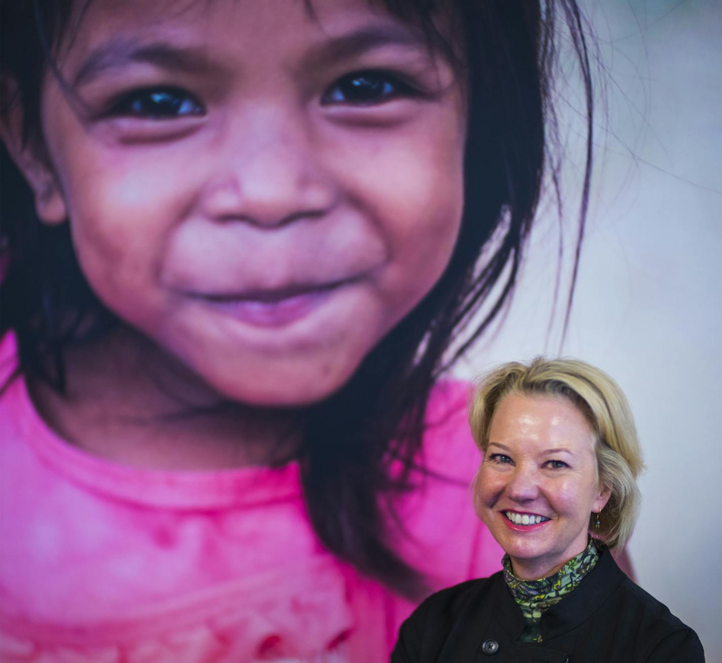 Amy Goldman is the CEO and Chair of the GHR Foundation. She is standing in front of a giant photo of a child from the M'Lop Tapang, a day center in Cambodia that was a helped in its effort to bring children together with a family.]GHR, which has committed $3 million to the challenge over the next three years, is seeking ideas from nonprofits, community groups even businesses that will bridge solutions in two of the three issue areas: peace, prosperity and planet. Richard Tsong-Taatarii/richard.t