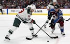 Wild center Luke Kunin, left, took on Gabriel Bourque and the Avalanche on Friday. Two nights later, a knee injury against the Detroit Red Wings ended