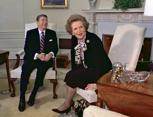 1985 photo: British Prime Minister Margaret Thatcher is seen with her friend and political ally President Ronald Reagan during a visit to the White Ho