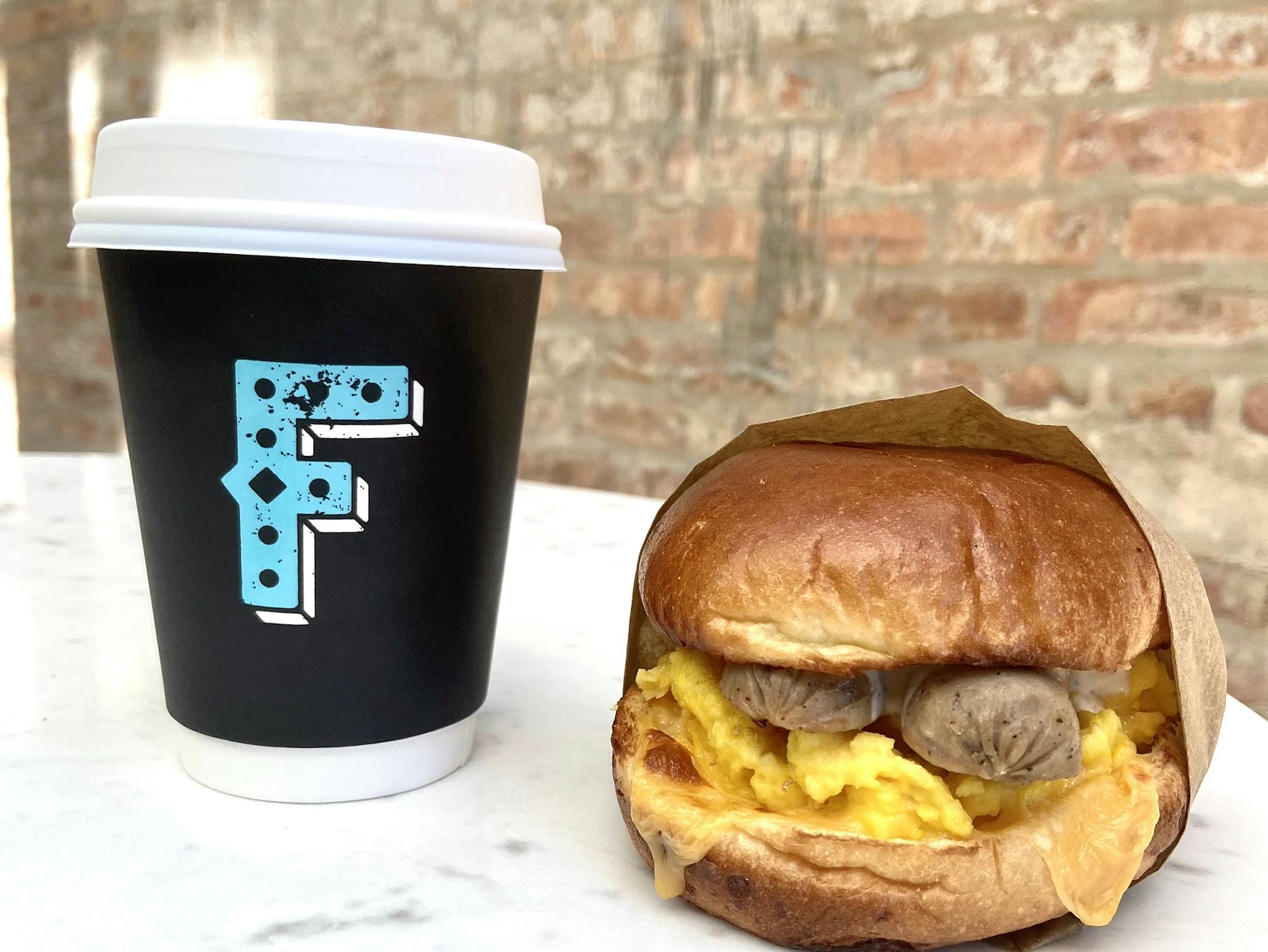 Fairgrounds Coffee and Tea is giving away a free 12-ounce cup of Adelaide's Blend with the purchase of any breakfast or lunch item.