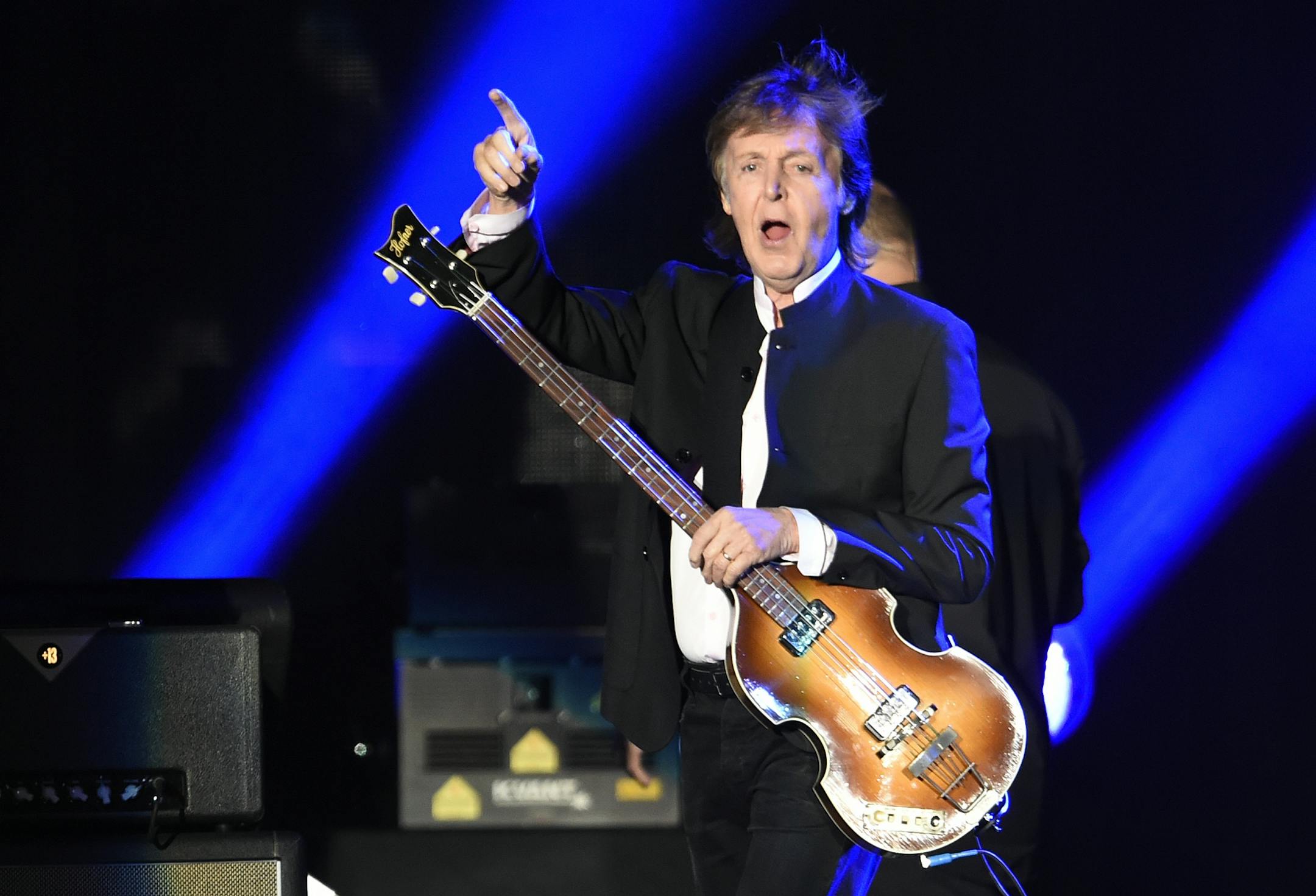Paul McCartney greets the crowd as he arrives onstage for his performance on day 2 of the 2016 Desert Trip music festival at Empire Polo Field on Saturday, Oct. 8, 2016, in Indio, Calif.