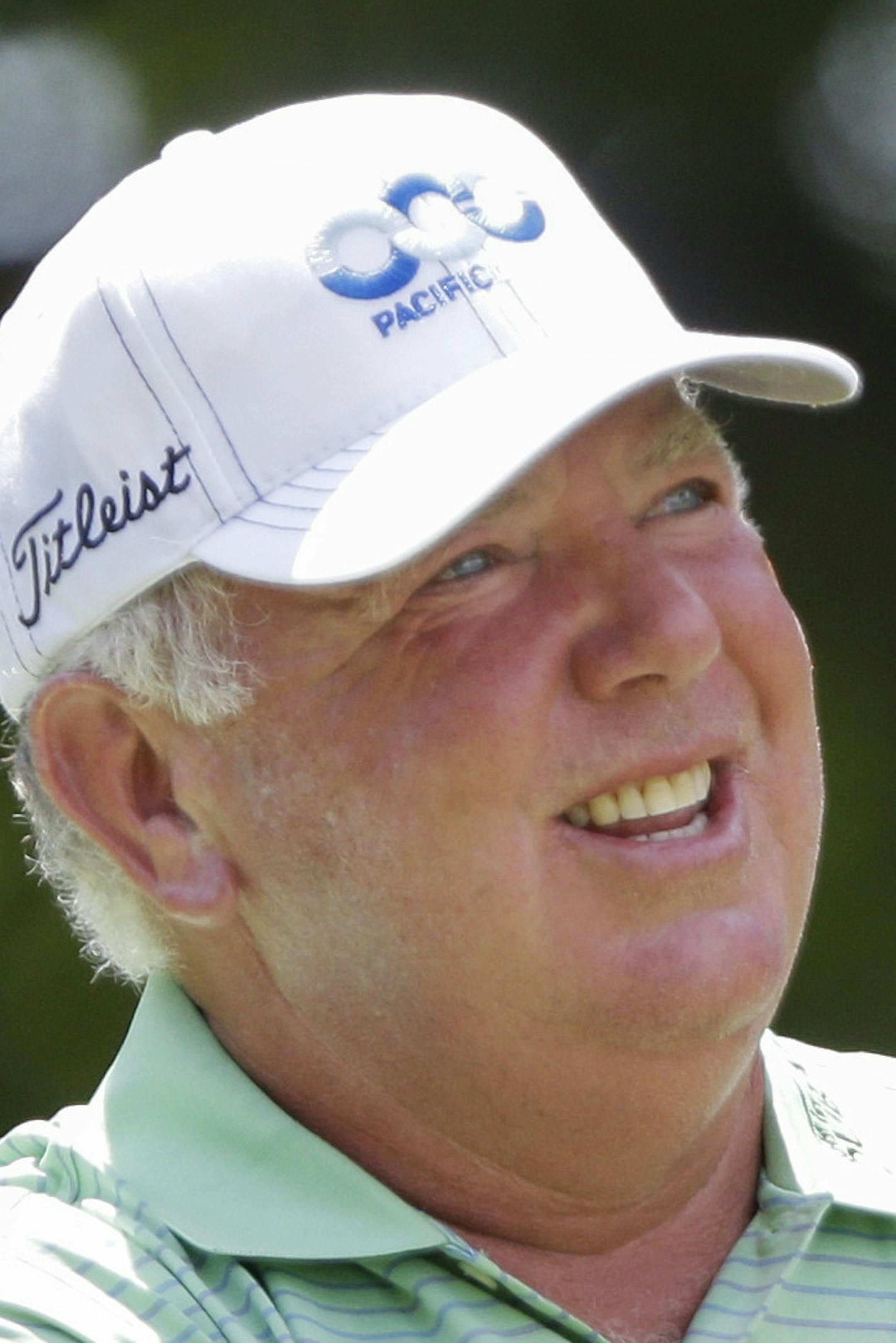 Mark O'Meara tees off on the third hole Sunday, July 14, 2013, in the final round of the U.S. Senior Open golf tournament in Omaha, Neb. (AP Photo/Nati Harnik)