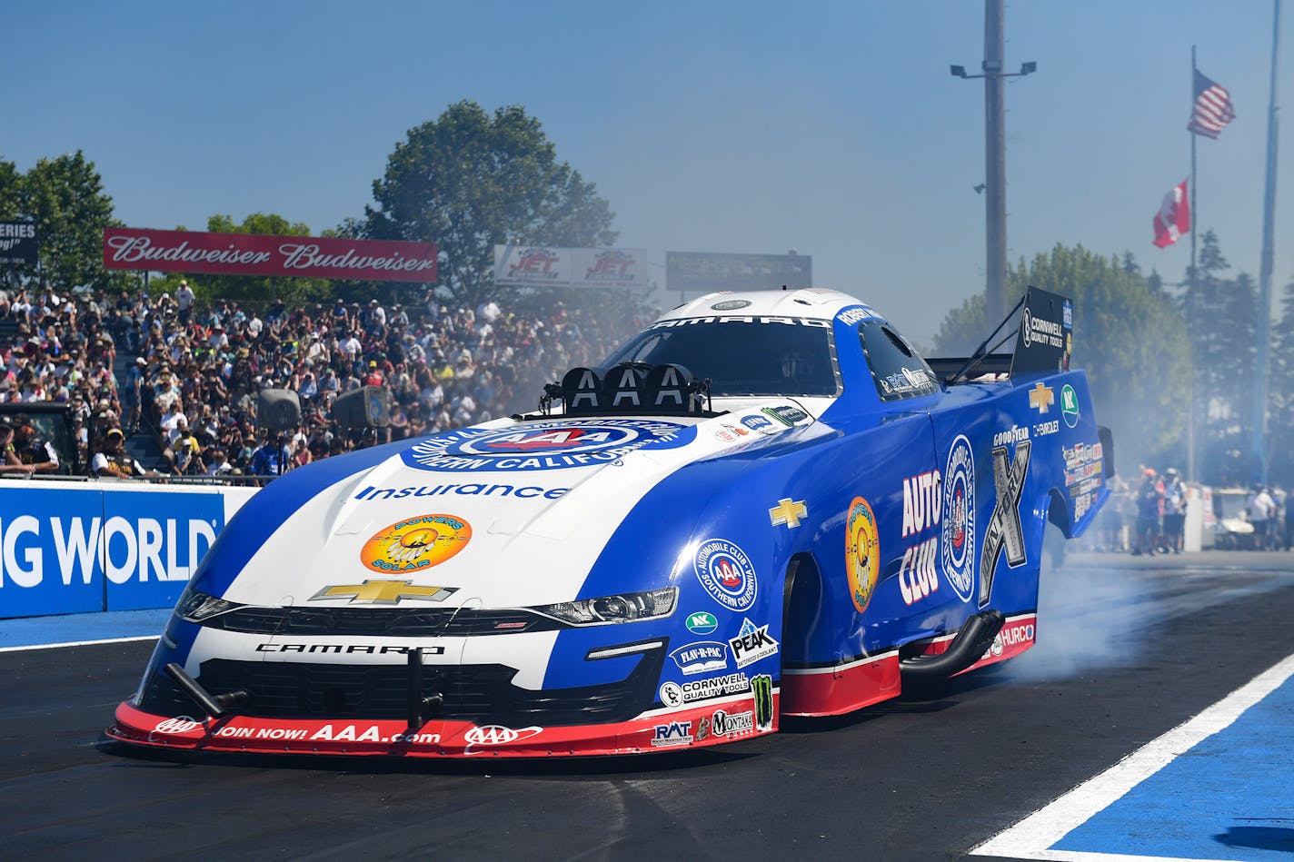 In this photo provided by the NHRA, Robert Hight drives during Funny Car on the final day of the Flav-R-Pac NHRA Northwest Nationals drag races at Pacific Raceways on Sunday, July 31, 2022, in Kent, Wash. Hight defeated JR Todd in the final. (Marc Gewertz/NHRA via AP)