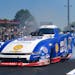 In this photo provided by the NHRA, Robert Hight drives during Funny Car on the final day of the Flav-R-Pac NHRA Northwest Nationals drag races at Pac