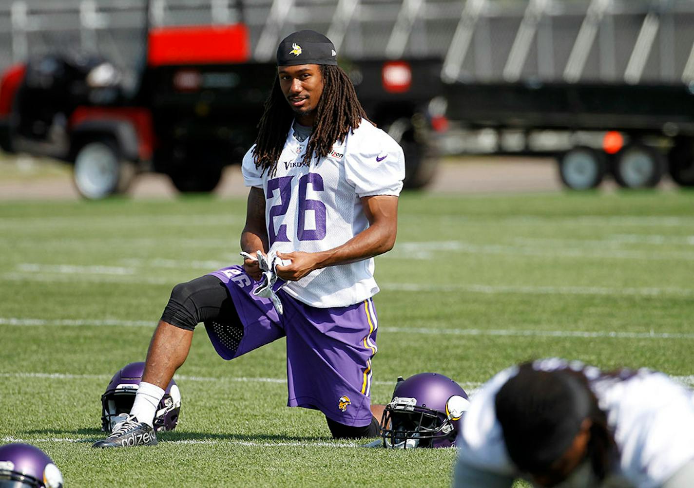 Minnesota Vikings cornerback Trae Waynes (26) stretches during NFL football minicamp