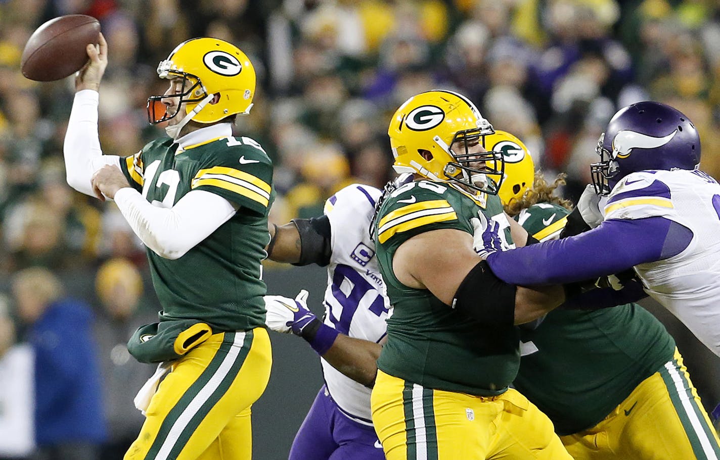 Everson Griffen (97) sacked Aaron Rodgers (12) forcing a fumble that was picked up by Captain Munnerlyn and returned for a touchdown in the third quarter. ] CARLOS GONZALEZ &#xef; cgonzalez@startribune.com - January 3, 2016, Green Bay, WI, Lambeau Field, NFL, Minnesota Vikings vs. Green Bay Packers