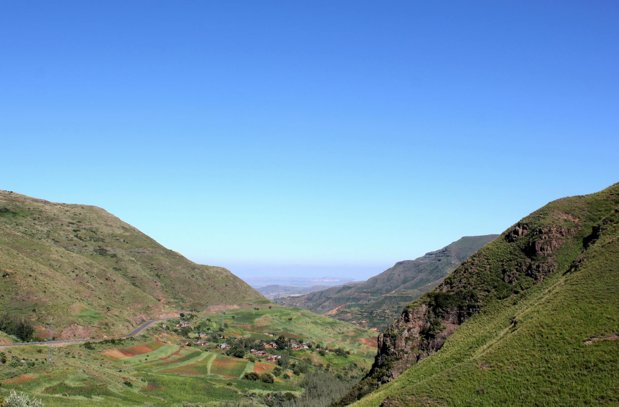 Men hauling kindling outside Mokhotlong Camptown (photo credit: Ellen Block)