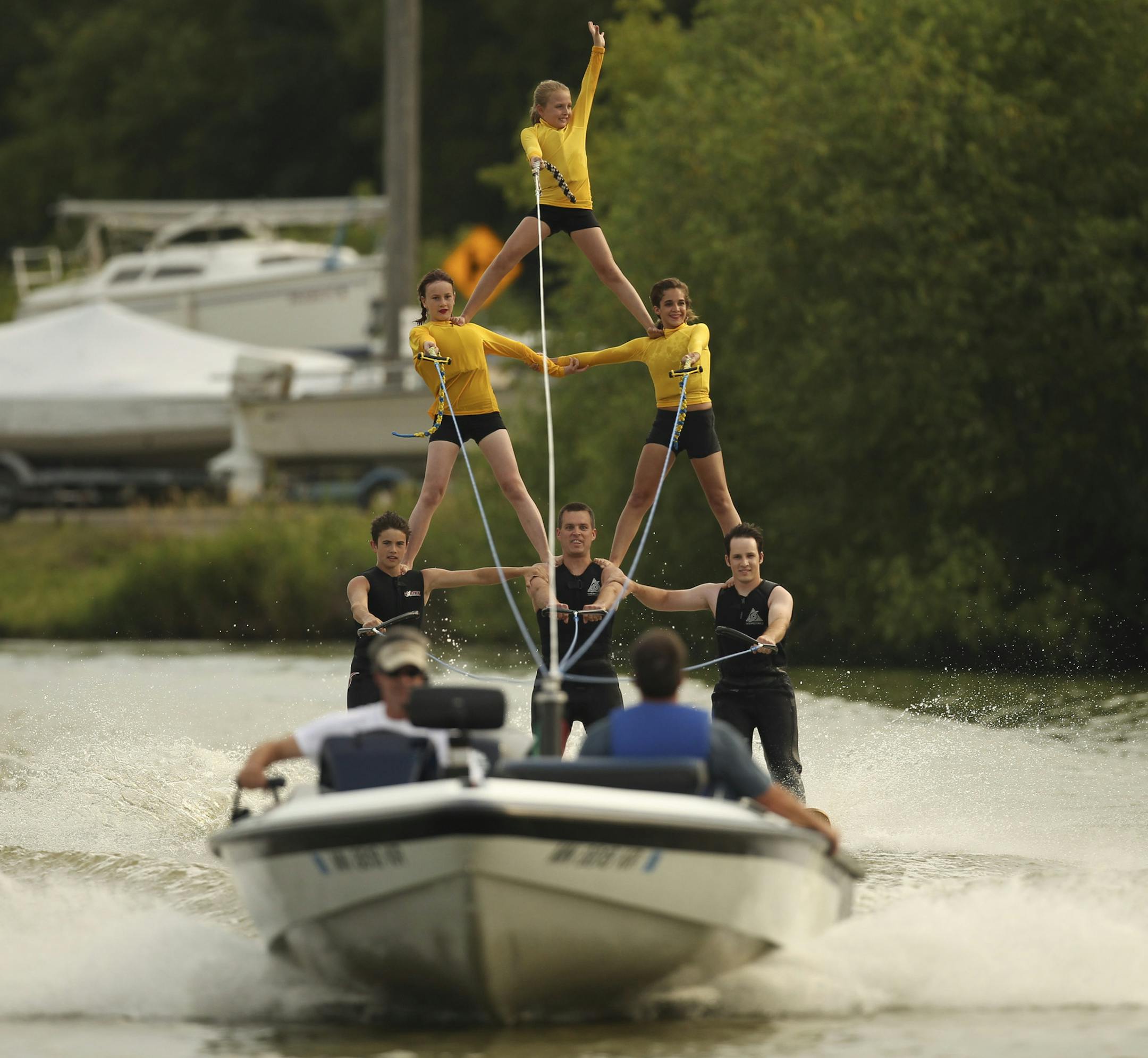 The Midwest Ski Otters Water Ski Team performs free water ski shows most Sundays for the rest of the summer on Little Goose Lake in White Bear Lake, Minn. Sunday night, July 1, 2012 was their Independence Day show. Early in the show, the junior members of the team formed a pyramid for the crowd. ] JEFF WHEELER ‚Ä¢ jeff.wheeler@startribune.com